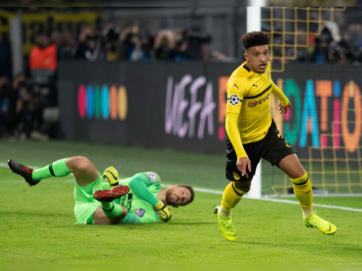 Borussia Dortmund thrash Atletico Madrid as Jadon Sancho scores first Champions League goal