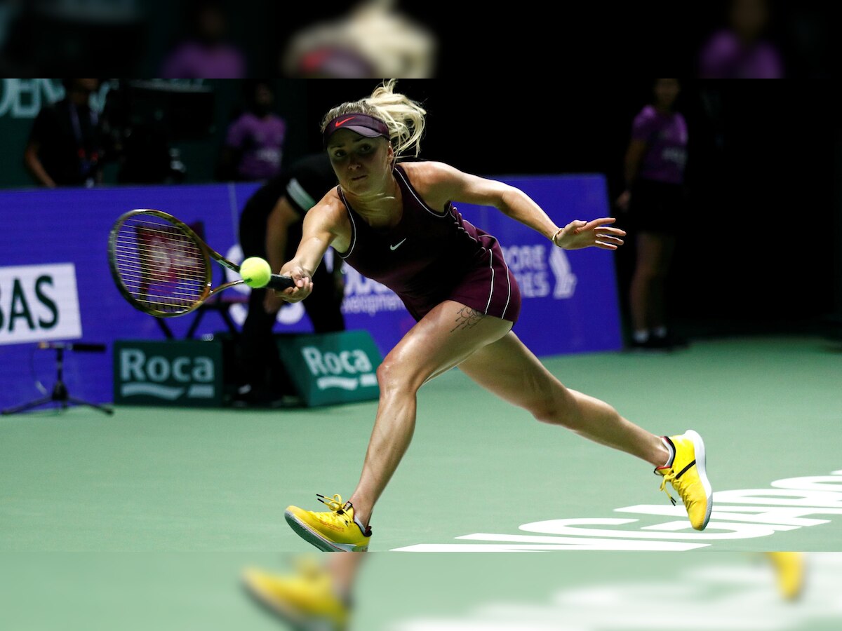 WTA Finals: Elina Svitolina advances as Caroline Wozniacki crashes out in Singapore