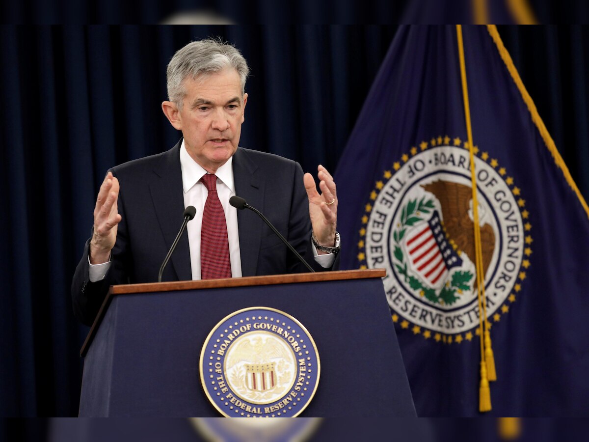 US Fed raises lending rates for 4th time this year, defies President Trump