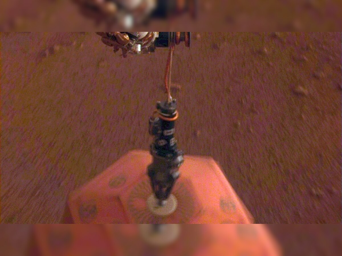 NASA's InSight Lander places first instrument on Mars