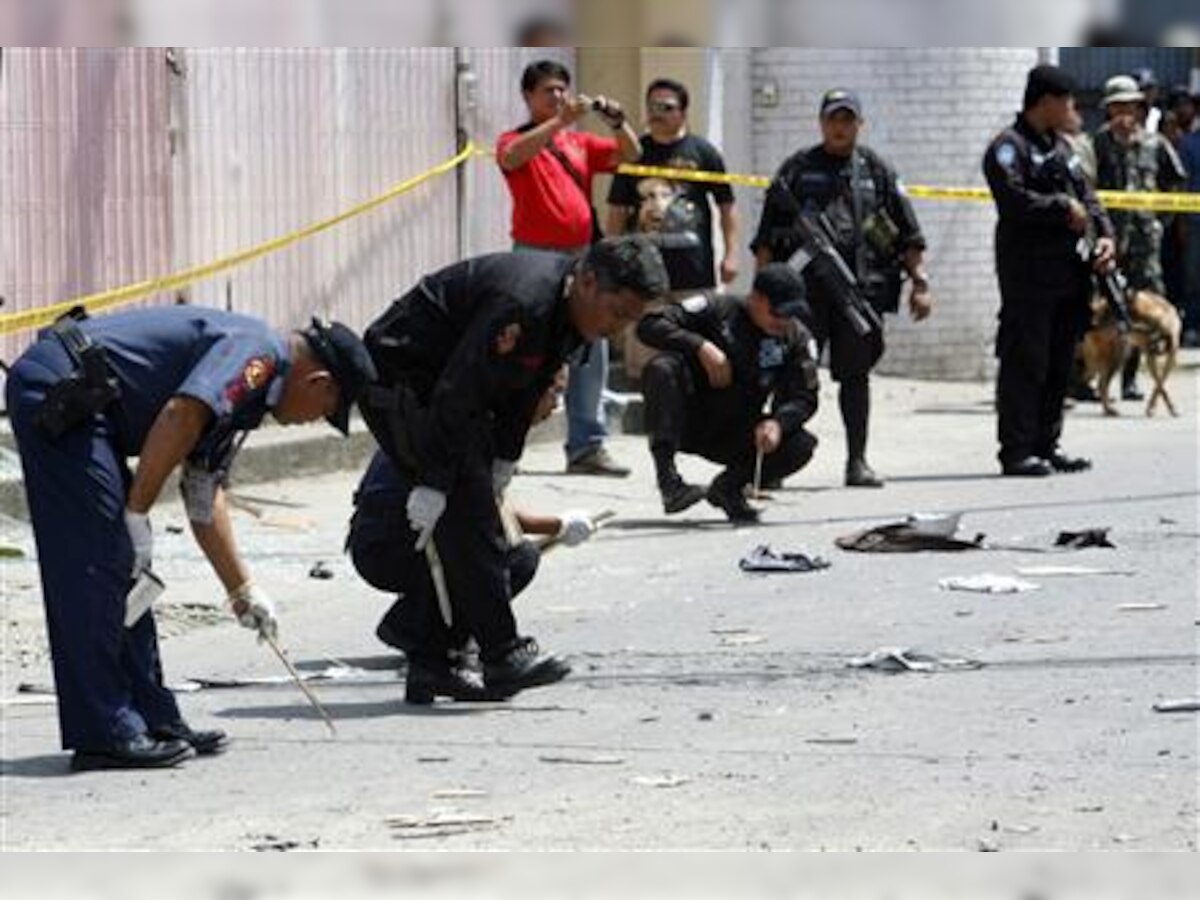 Twin bombings at southern Philippines church kill at least 21