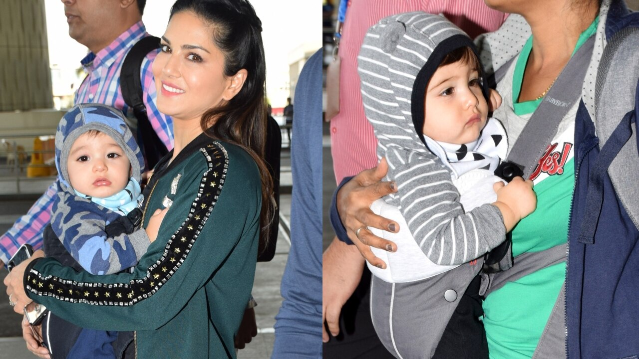 Sunny Leone protecting her twin babies from camera flashes 