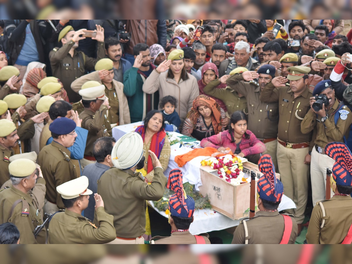 Pulwama attack: CRPF jawan's 10-year-old daughter faints during cremation; sombre atmosphere at 12 UP funerals