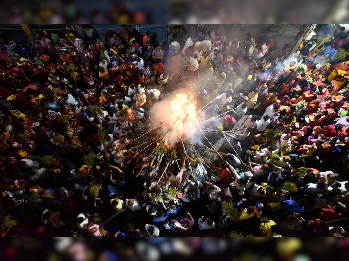 Holi Celebrations 2019: Effigies of Masood Azhar, Hafiz Saeed set aflame on Holika Dahan in Patna 