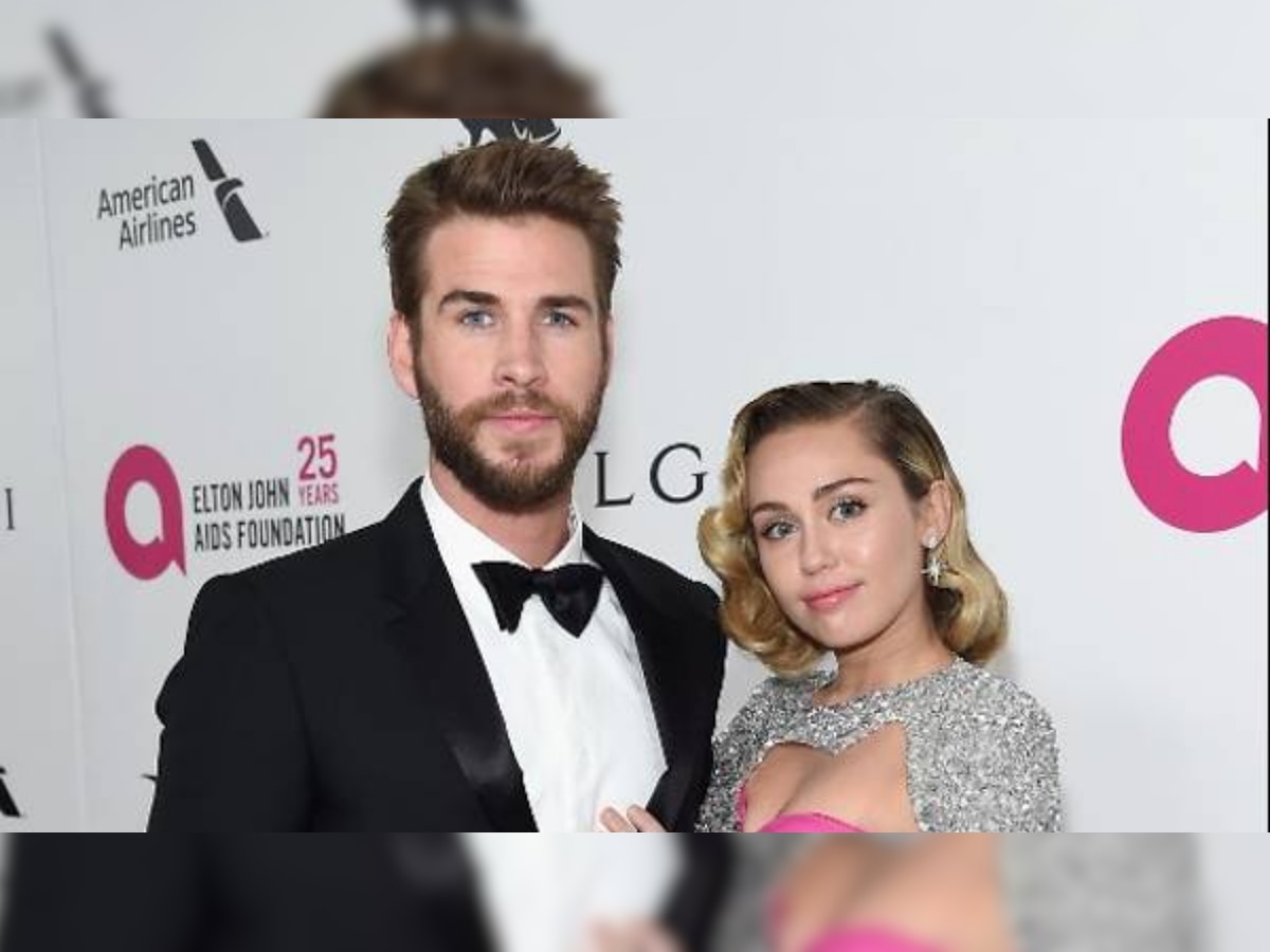 Miley Cyrus forcefully kissed by a fan while walking with husband Liam Hemsworth in Spain in this shocking video