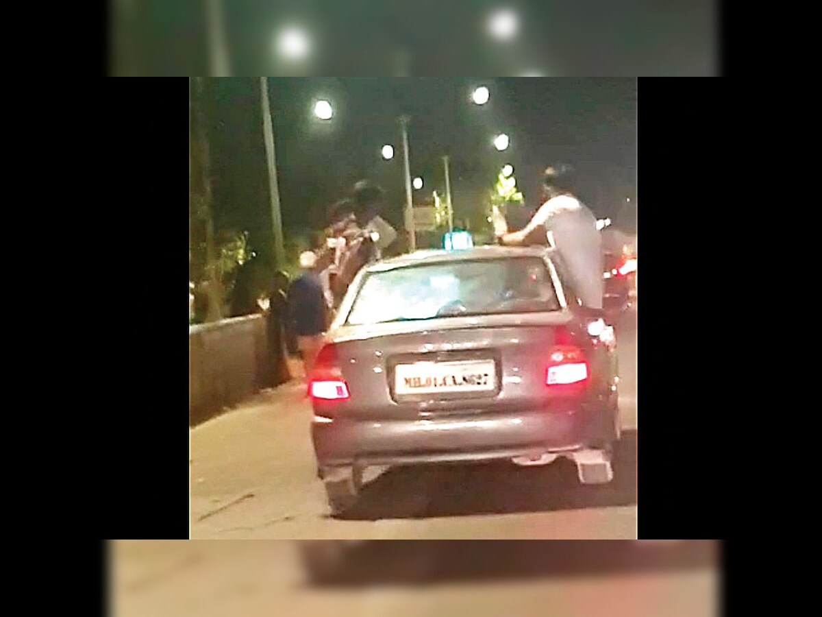 Three held for bottle stunts in moving car in Bandra