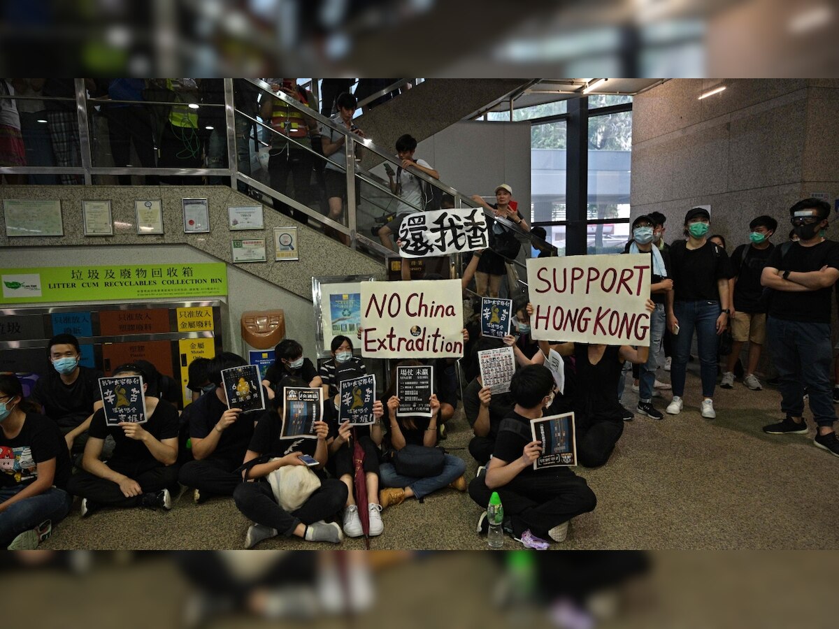 Thousands converge on Hong Kong parliament in fresh anti-government demonstration