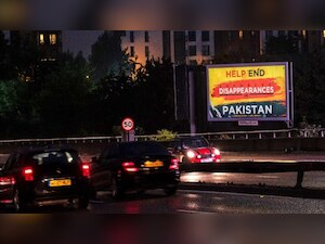 Activists put up billboards across Birmingham requesting help in ending enforced disappearences in Pakistan
