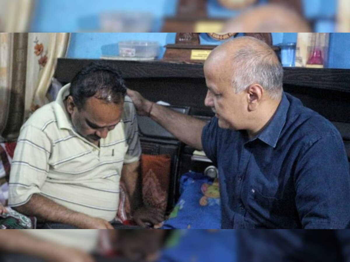 Delhi: Manish Sisodia hands over Rs 15 lakh each to families of Ankit Saxena and Dhruv Tyagi