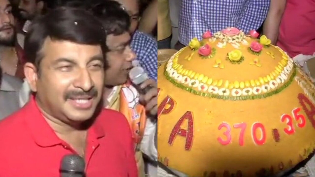 PATNA, INDIA - JANUARY 5: BJP MP Sushil Kumar Modi cutting the cake to  celebrating his 71st