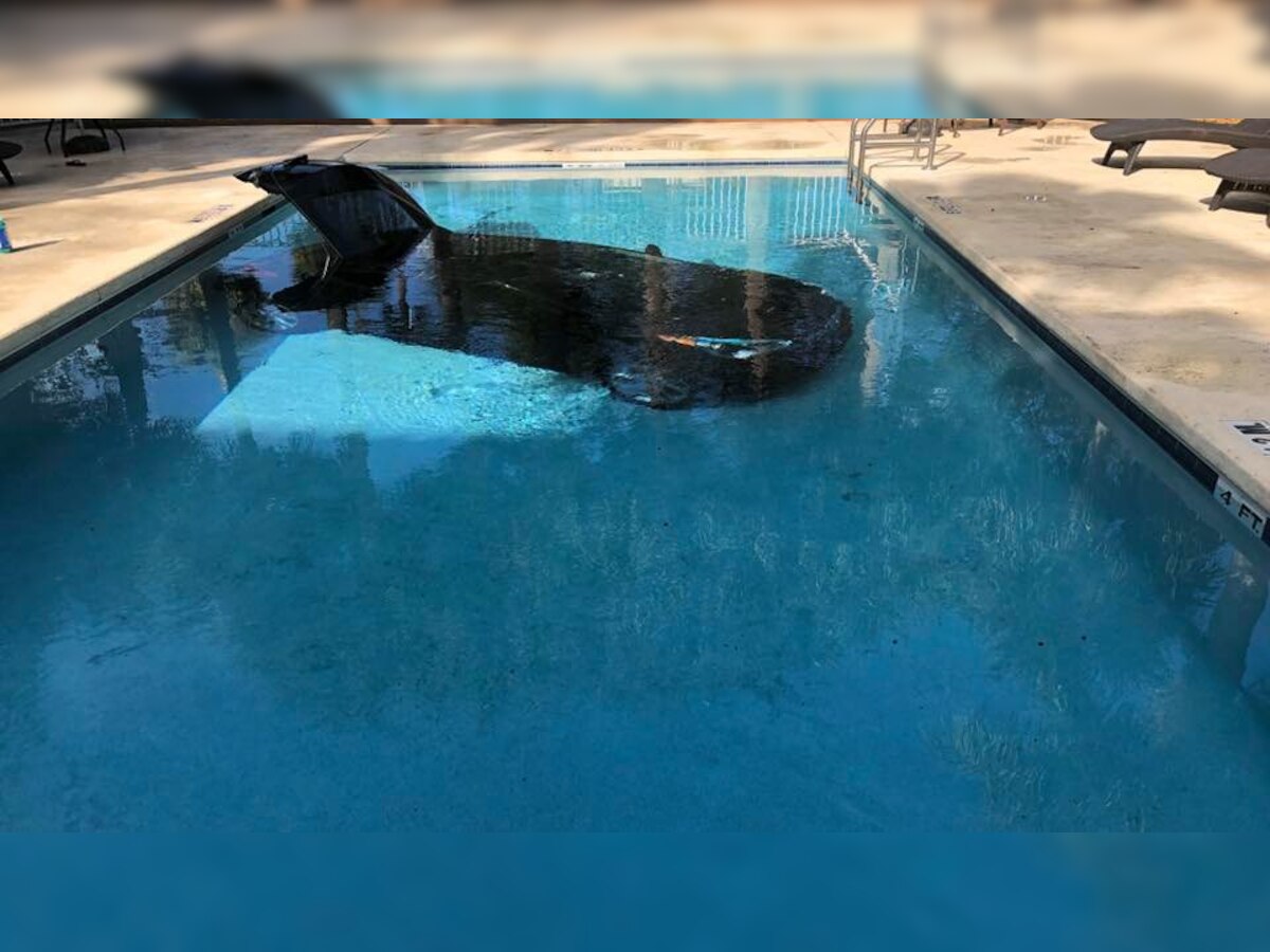 Netizens react hilariously as pictures of car submerged in hotel pool in Florida go viral