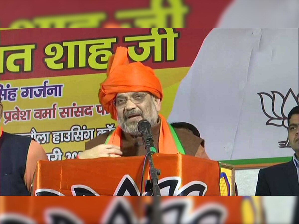 'If competition to make false promises is held...': Amit Shah's jibe at Arvind Kejriwal