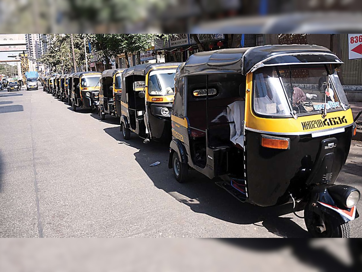 Auto rickshaw moving on the road, Chennai, Tamil Nadu, India Stock