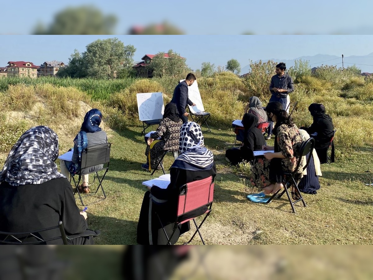 A free open-air class in Kashmir which depends on sun, rain and clouds