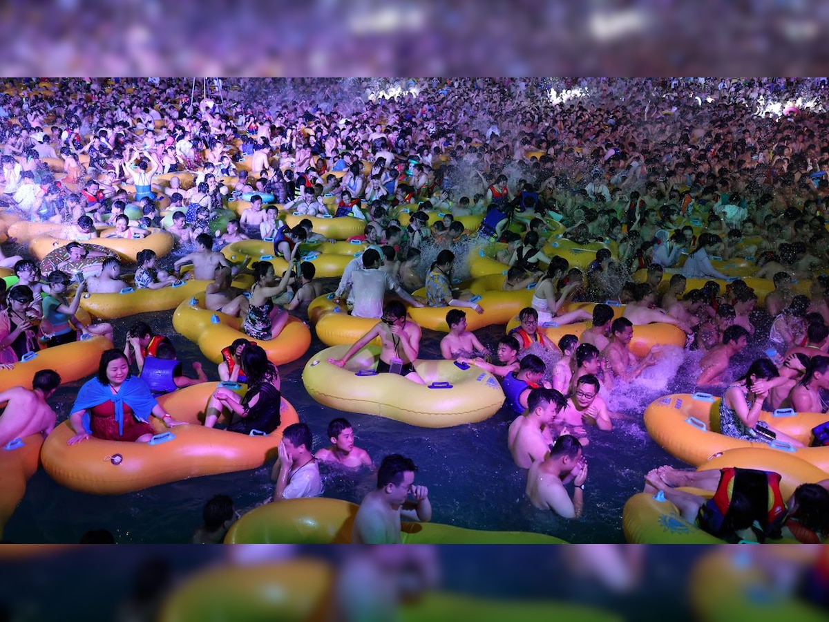 Chinese state newspapers show allegiance to Wuhan park pool party after pictures go viral