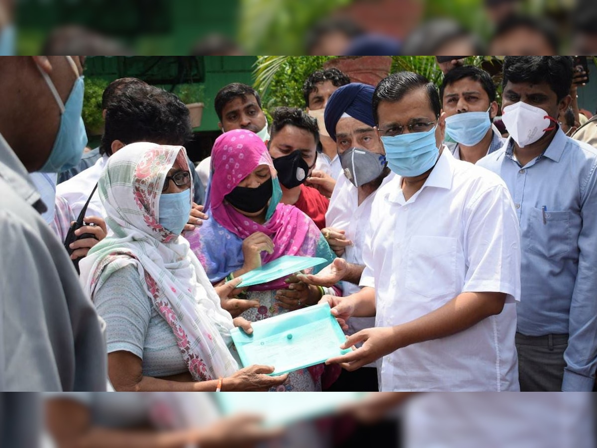 Delhi CM Arvind Kejriwal hands over Rs 1 crore cheque to kin of sanitation worker who died of COVID-19