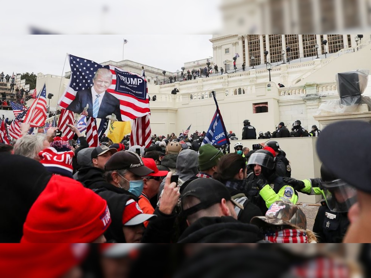 Pro-Trump protesters storm US Capitol as Congress certifies Biden's win; woman shot dead