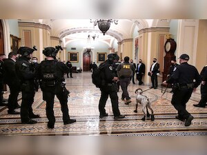US Capitol riots: Man pictured carrying Speaker Nancy Pelosi's lectern ...