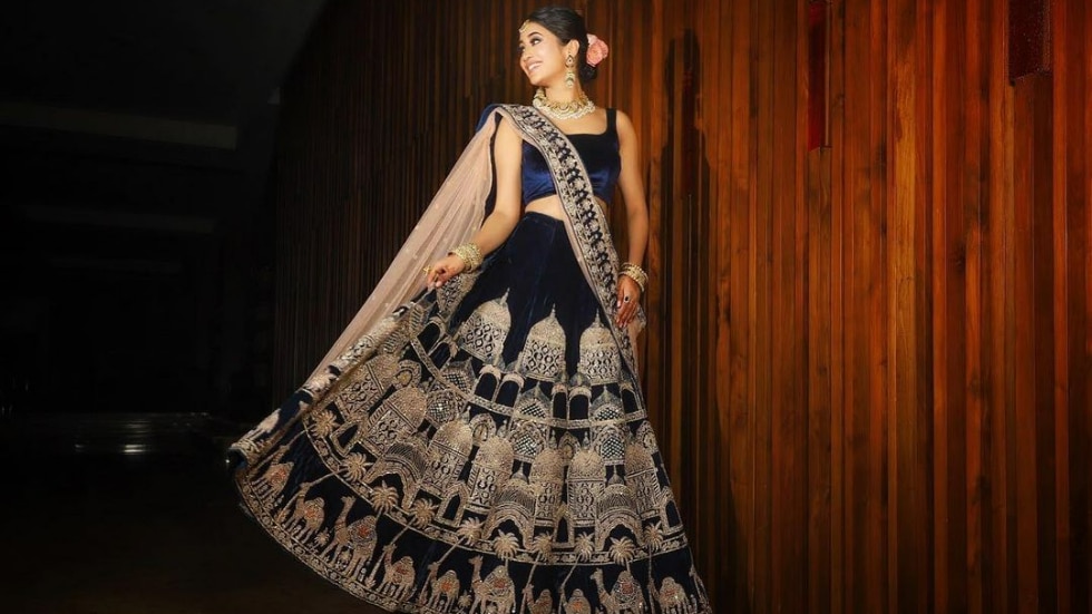 Shivangi Joshi lehenga: Shivangi Joshi flaunts stylish backless blouse in  new video; swirls and twirls in a heavily sequined lehenga