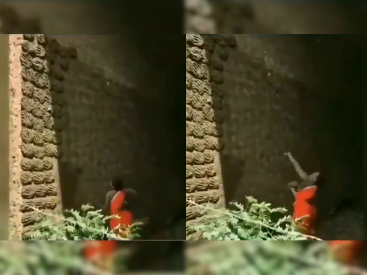 Viral: Woman perfectly sticks cow dung cakes on wall, netizens suggest her to join basketball team