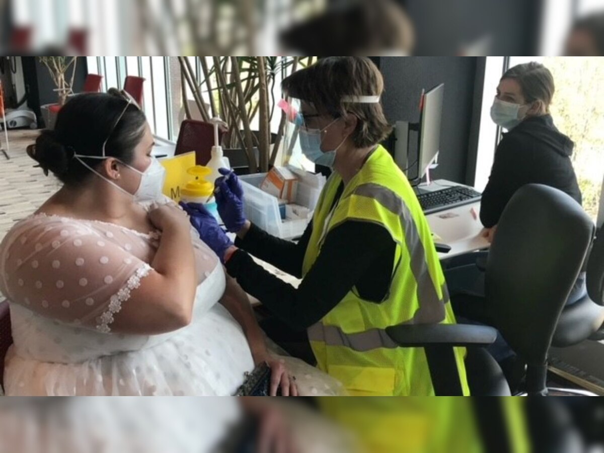 Woman gets vaccinated in wedding dress, here's why