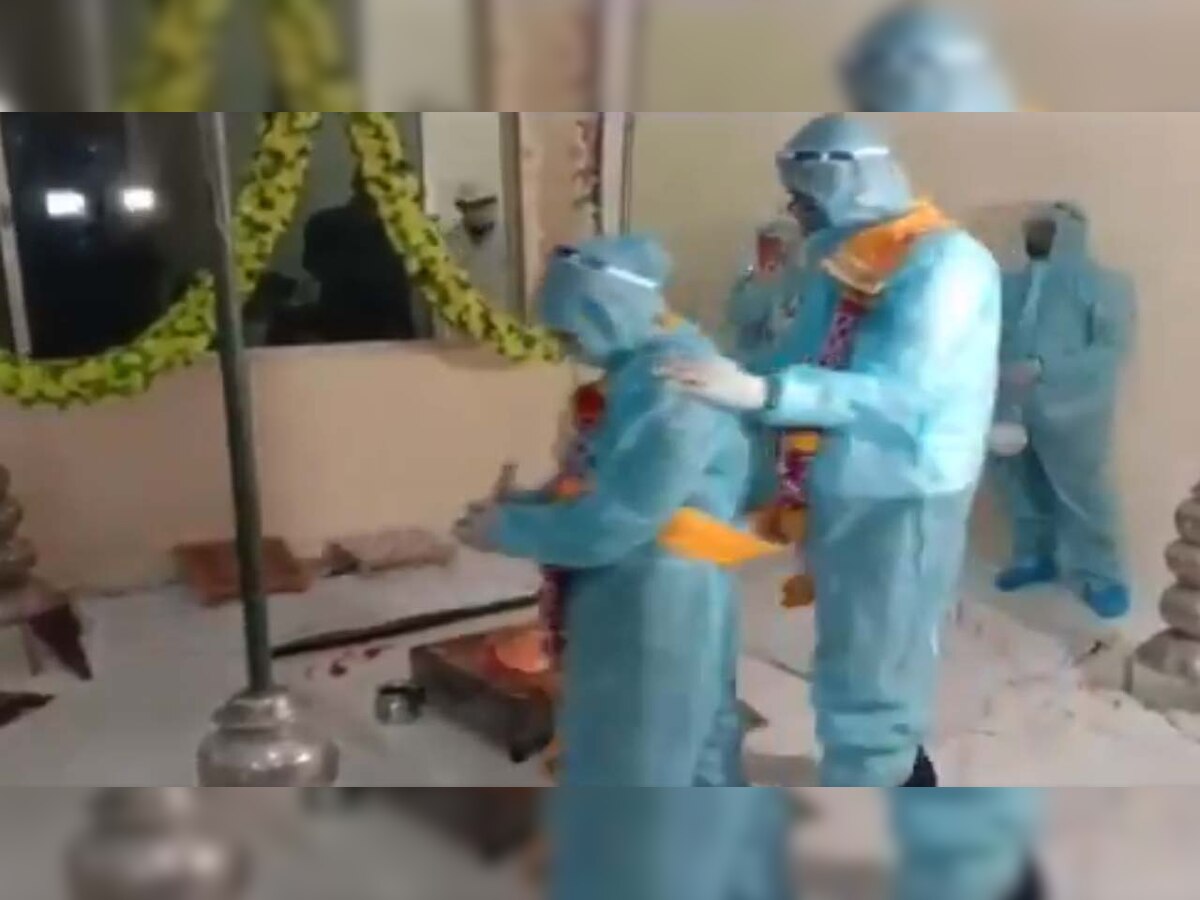 Viral: Madhya Pradesh couple tie knot in PPE kits after groom tests positive for COVID-19