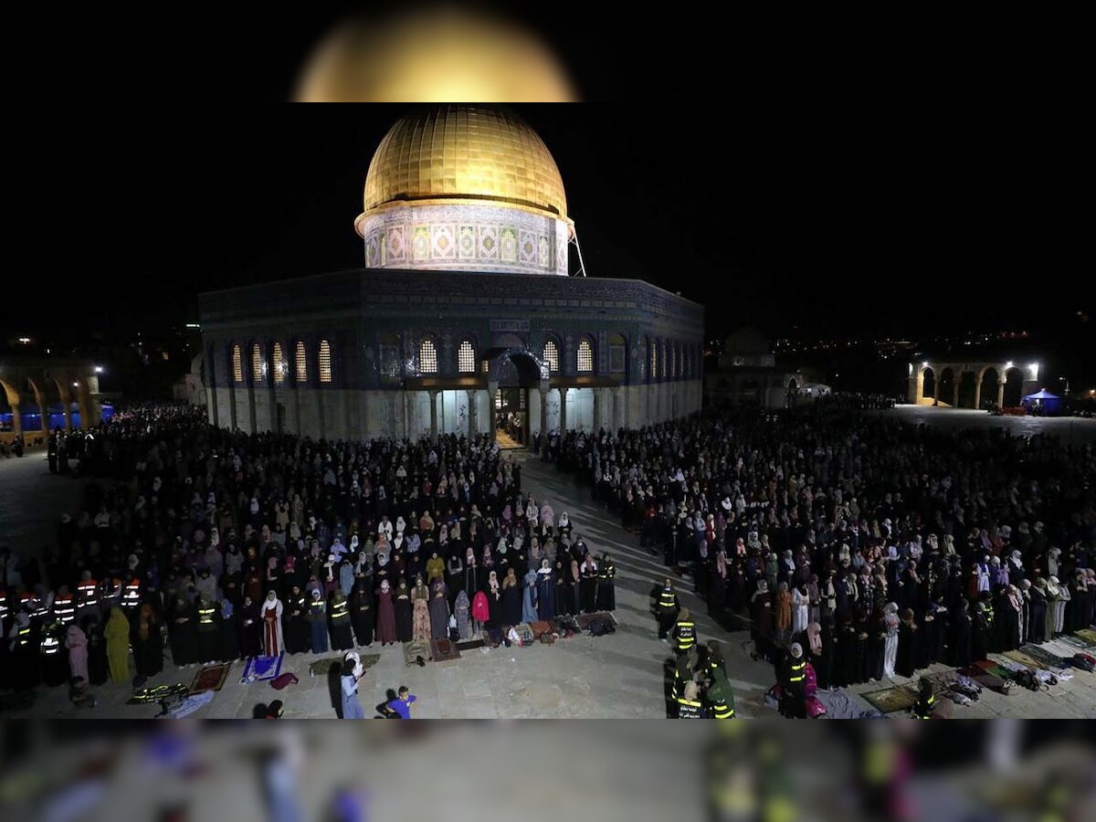 Palestinians perform Eid prayers at Al Aqsa mosque compound