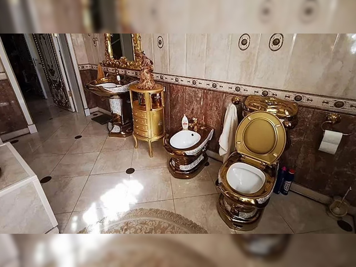 Video: Golden toilet, kitchen, halls found in cop's lavish mansion