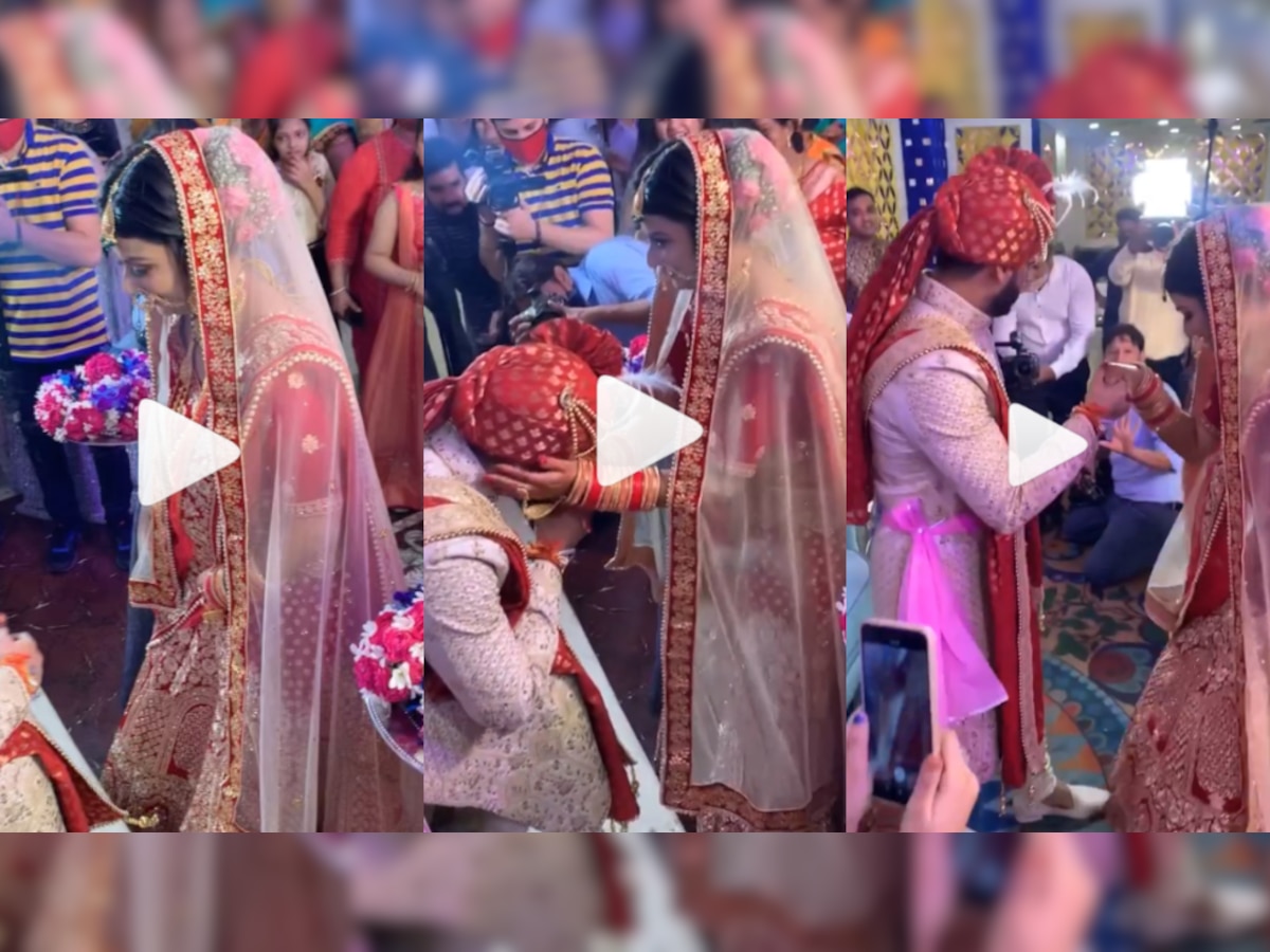 Mesmerised by his bride's beauty, groom makes grand gesture on wedding stage - WATCH viral video