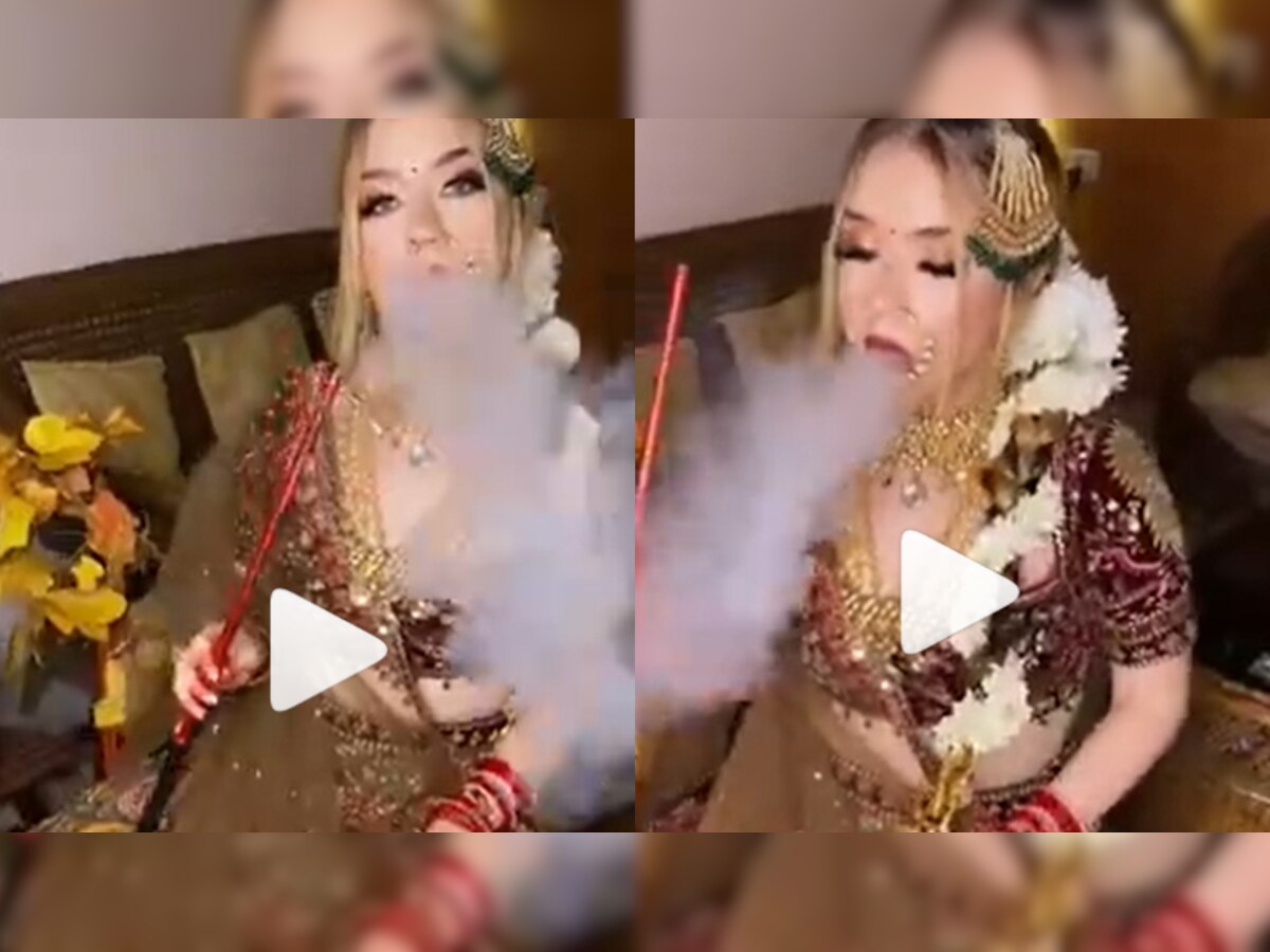 Dhuaan Dhuaan Dulhan! Bride makes rings of smoke dressed in heavily embellished wedding dress - WATCH viral video