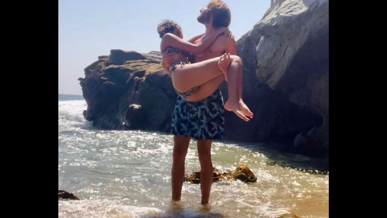 Shane Gregoire picks up Aaliyah in her arms