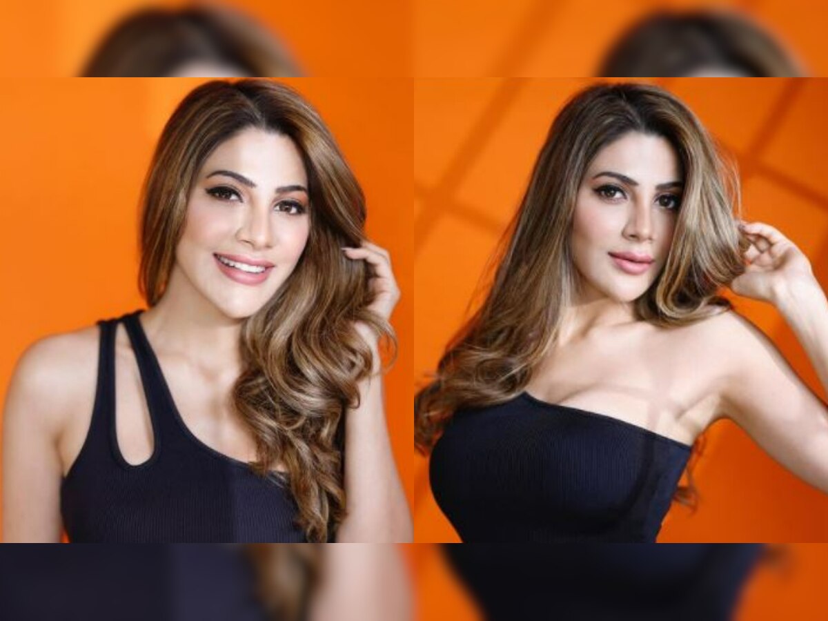 'When life gives you curves': Nikki Tamboli burns up internet with her sizzling hot photos in sexy black dress