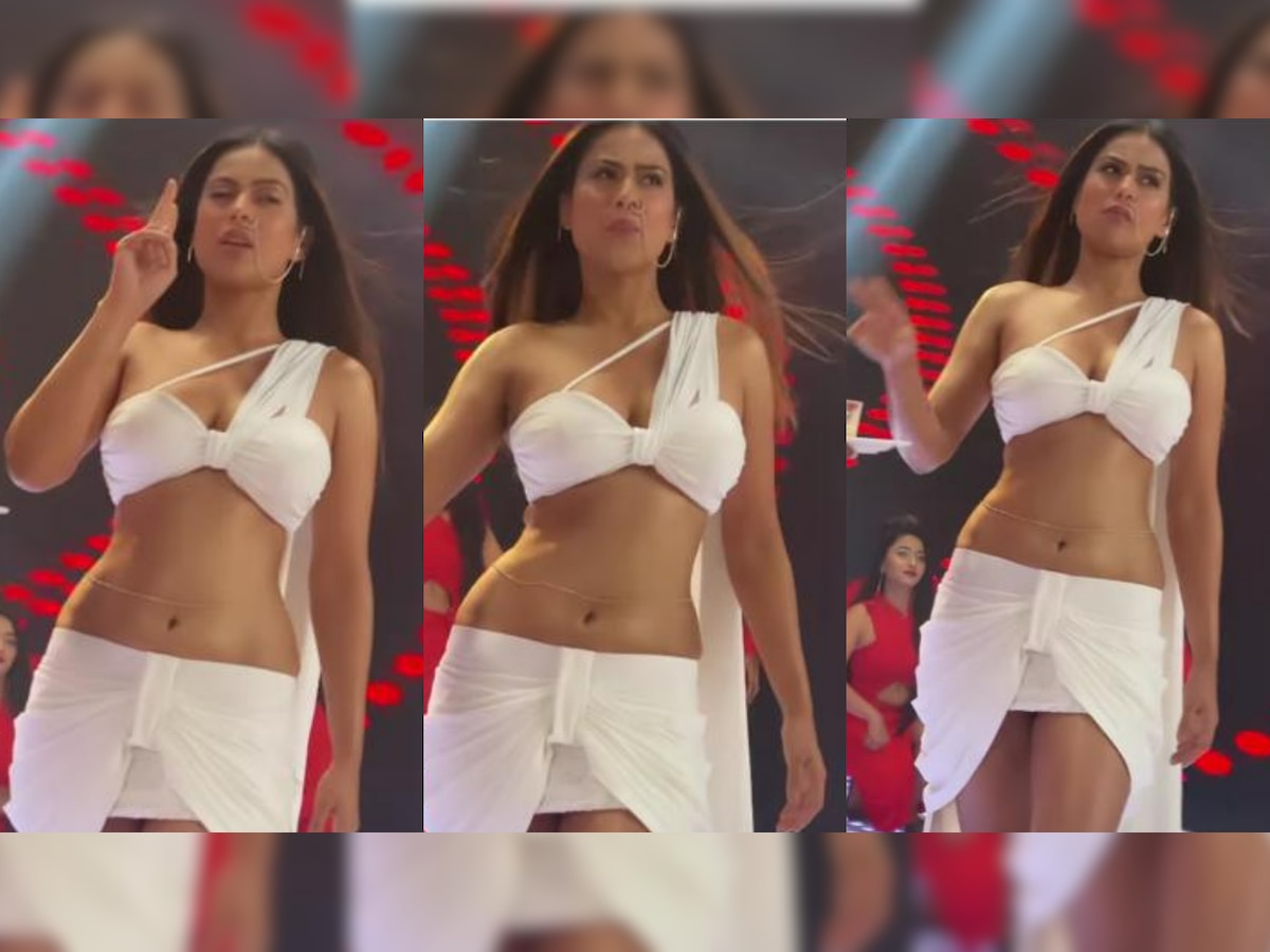 Nia Sharma sizzles in BOLD sexy white bralette and thigh-high slit drape  skirt - WATCH