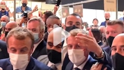 On camera, French President Emmanuel Macron hit by an egg during public visit - WATCH