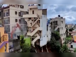 WATCH: Bengaluru building razed after it tilts due to heavy rains