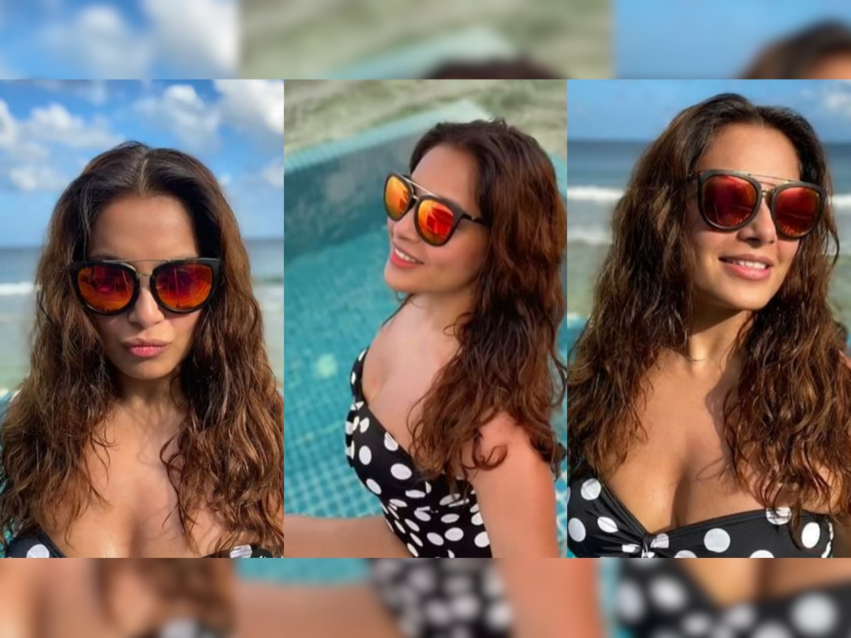 Bipasha Basu sets hearts racing in sexy black bikini as she holidays with husband Karan Singh Grover in Maldives