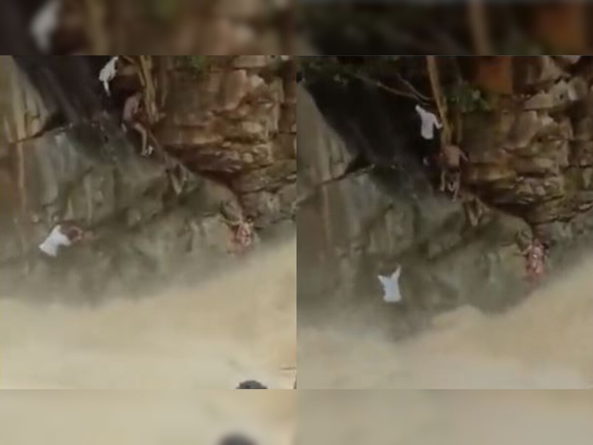 WATCH: Woman, baby stranded on raging waterfall, video goes viral