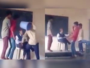 Students assault teacher with dustbin, netizens demand action - WATCH viral video