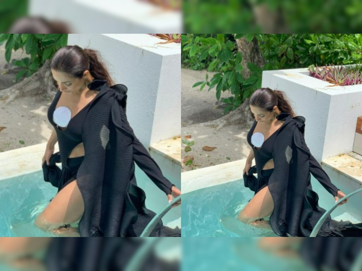 VIRAL! Malaika Arora turns up the heat with jaw-dropping pool photo in black cutout swimwear 