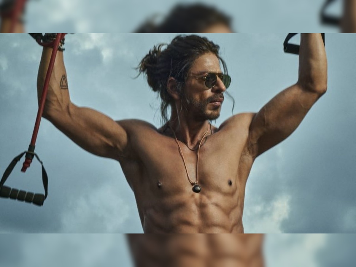 Shah Rukh Khan flaunts washboard abs, drops photo of his Pathaan look
