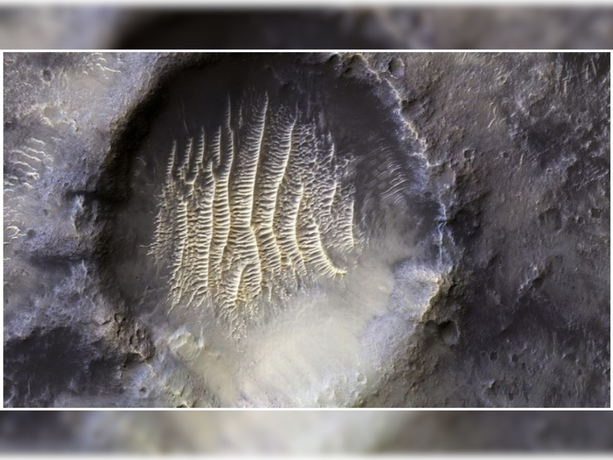 NASA shares amazing and mysterious high-resolution picture of crater on Mars