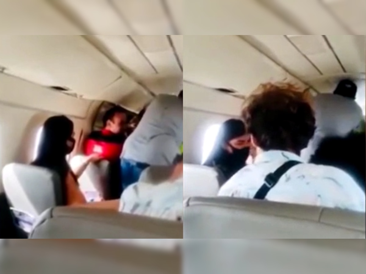 Passengers hold plane door after it opens mid-flight