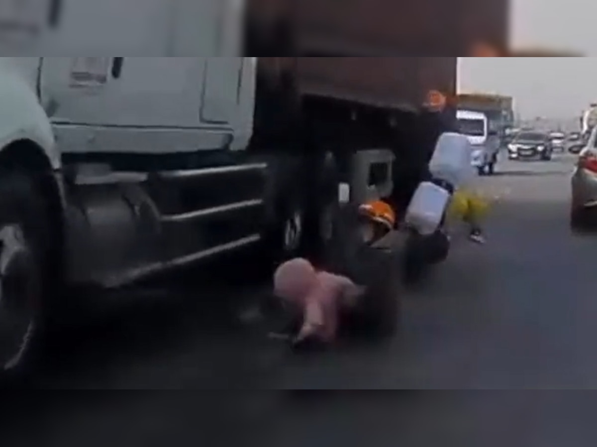 Viral video: Woman saves son from getting crushed under truck with lightning fast response