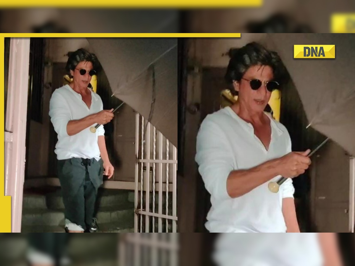 Shah Rukh Khan hides face behind umbrella as he gets spotted outside dubbing studio, netizens say 'nayi dulhan...'