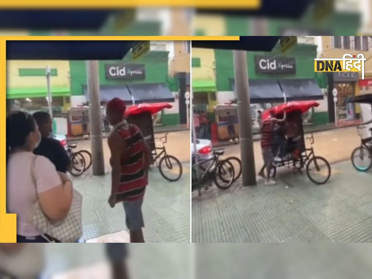 Viral Video: बारिश से बचने के लिए रिक्शे में बैठा कपल, फिर जो हुआ...