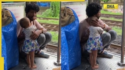 Viral video: Little girl gives her father fruit on Mumbai train, netizens reach for tissues