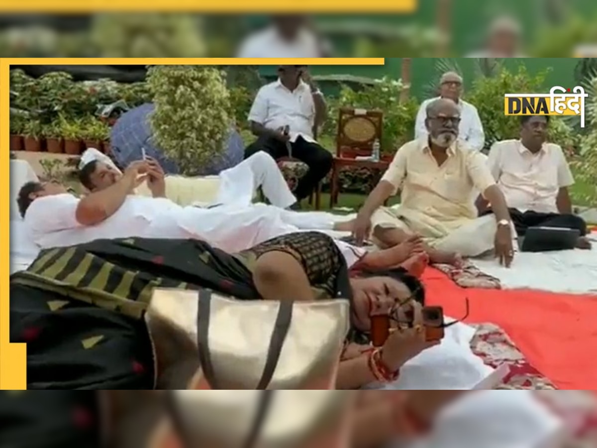 कांग्रेस के धरने का वीडियो वायरल, गांधीजी की नाक के नीचे लेटकर मोबाइल चलाते दिखे सांसद