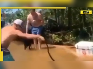 Man catches snake and mistakenly throws on other people, watch viral video