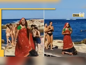 Bikini Babes के बीच लहंगा-चुनरी पहने घूमती दिखी महिला, लोग बोले - भारतीय नारी को सलाम