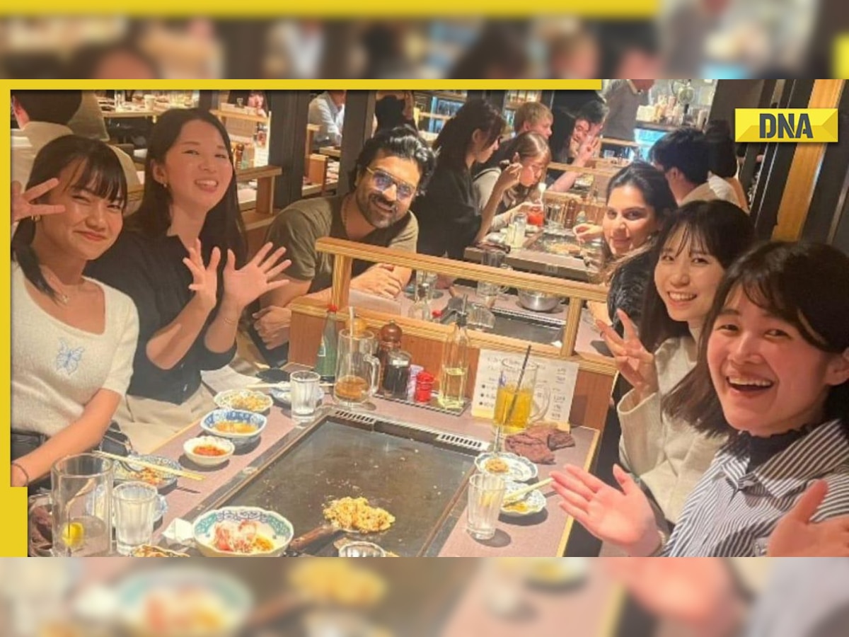 RRR star Ram Charan poses with Japanese fans in restaurant, receives customised gifts from admirers